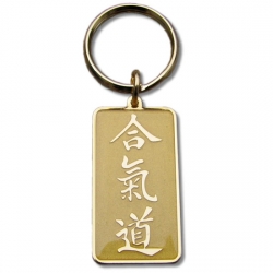 breloczek aikido złoty gadżet do kluczy